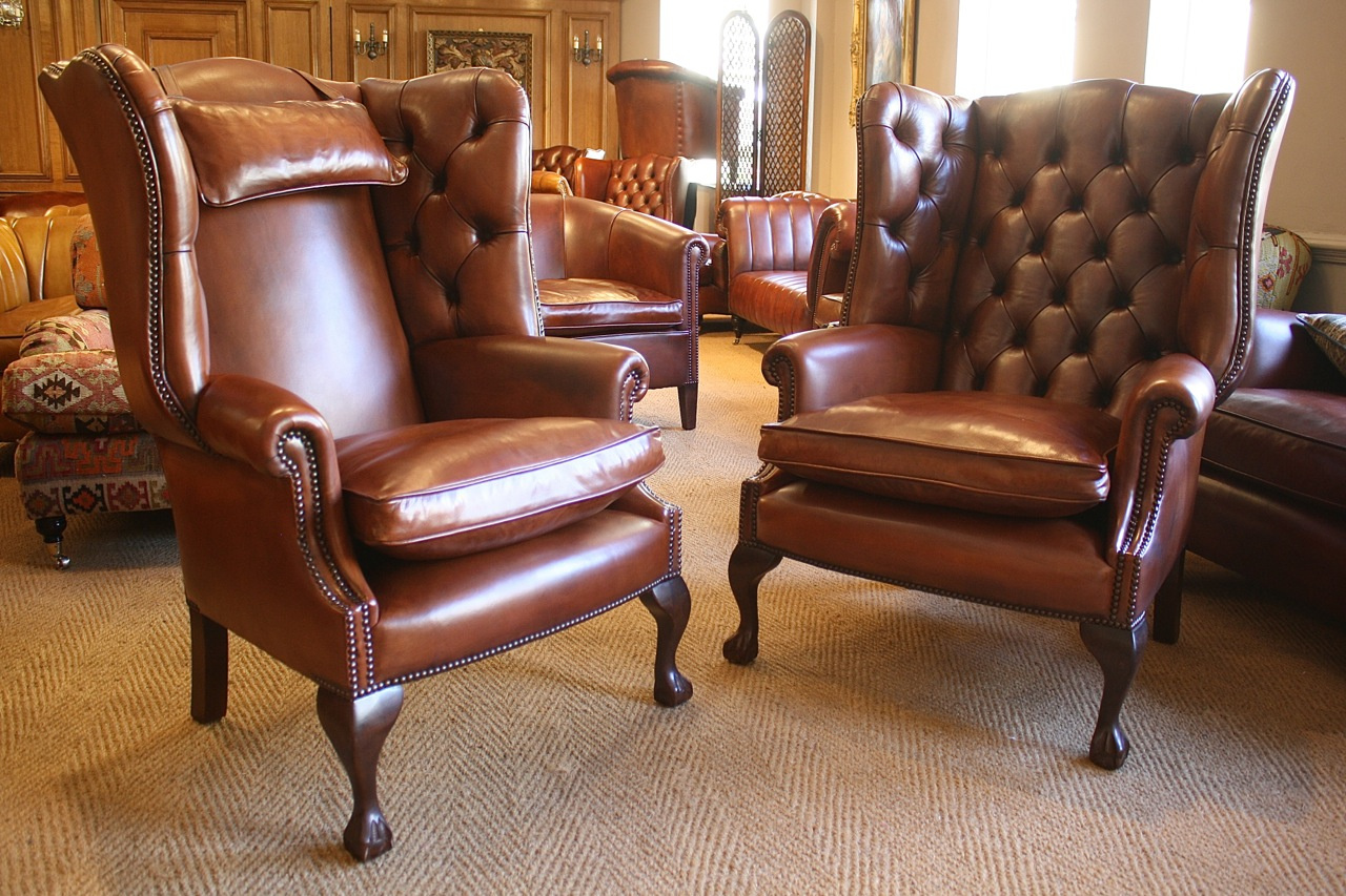 leather wingback chair and sofa